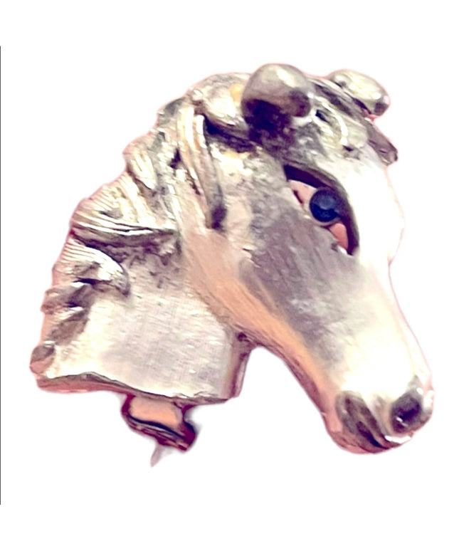 Vintage antiqued silver finish blue crystal eye horse brooch