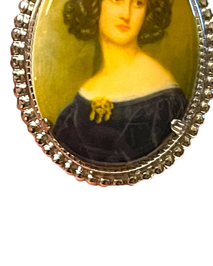 Vintage resin transfer silver finish cameo brooch oval