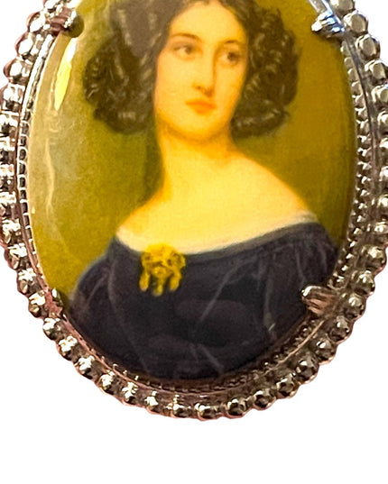 Vintage resin transfer silver finish cameo brooch oval
