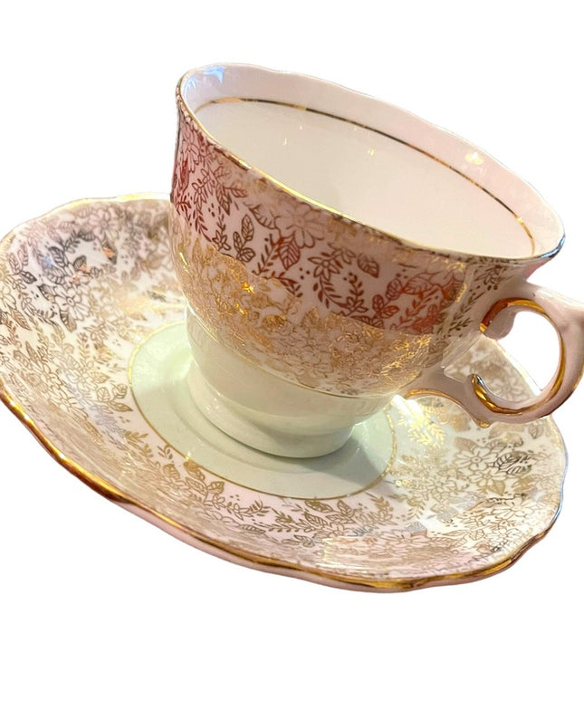 Vintage Colclough tea cup and saucer pastel green floral floral England gold