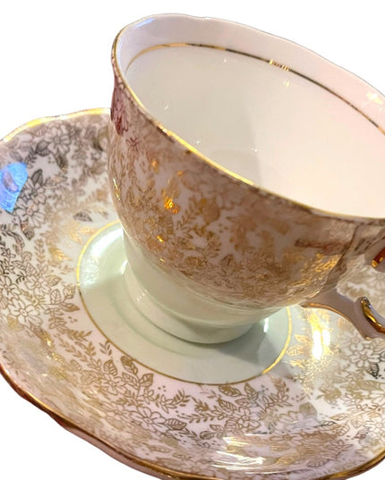 Vintage Colclough tea cup and saucer pastel green floral floral England gold