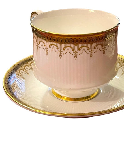 Vintage Paragon Athena tea cup and saucer gold magestic England fine chine