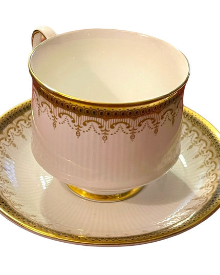 Vintage Paragon Athena tea cup and saucer gold magestic England fine chine