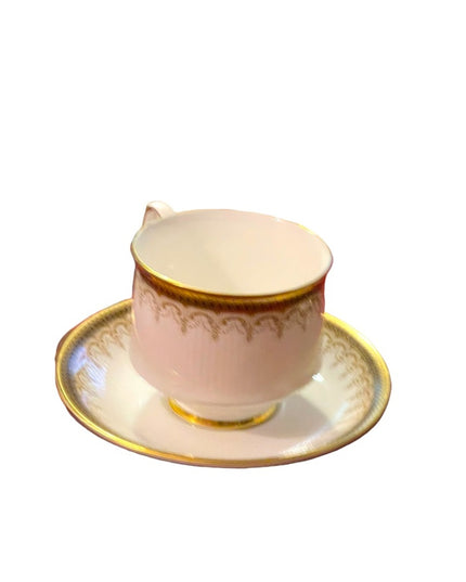 Vintage Paragon Athena tea cup and saucer gold magestic England fine chine