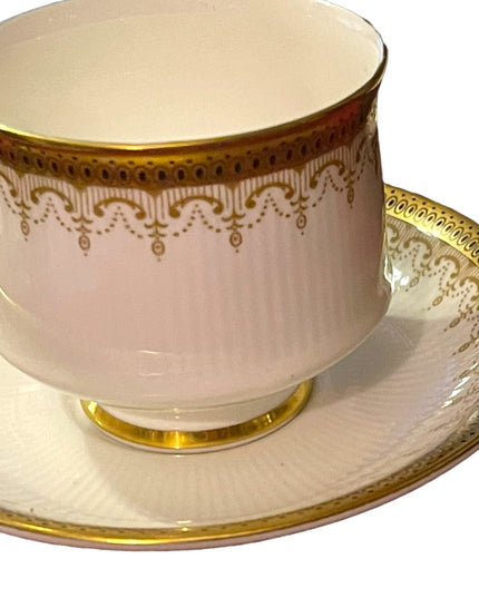 Vintage Paragon Athena tea cup and saucer gold magestic England fine chine