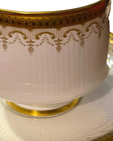 Vintage Paragon Athena tea cup and saucer gold magestic England fine chine