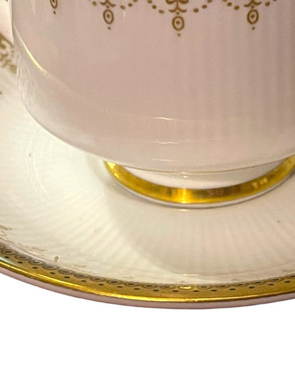 Vintage Paragon Athena tea cup and saucer gold magestic England fine chine