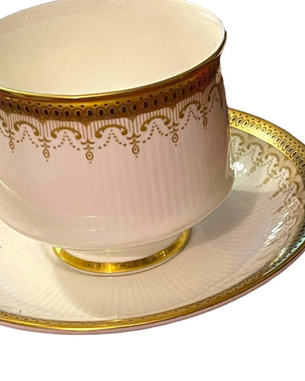 Vintage Paragon Athena tea cup and saucer gold magestic England fine chine