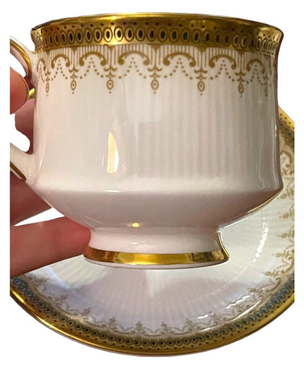 Vintage Paragon Athena tea cup and saucer gold magestic England fine chine