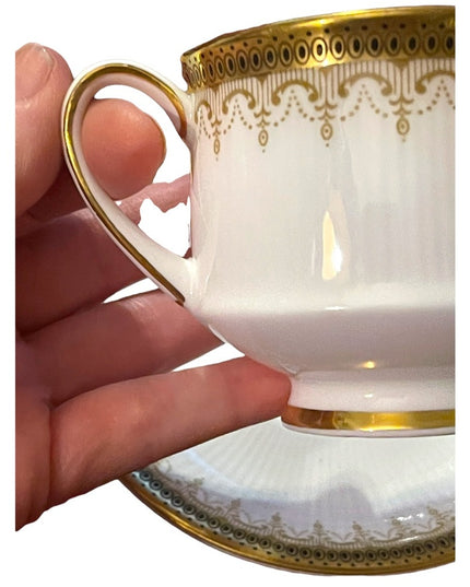 Vintage Paragon Athena tea cup and saucer gold magestic England fine chine