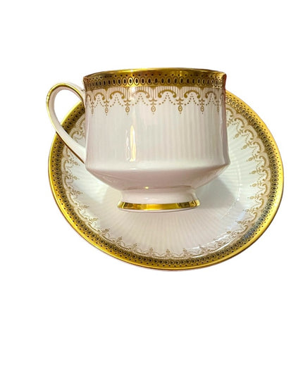 Vintage Paragon Athena tea cup and saucer gold magestic England fine chine