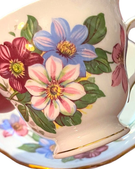 Vintage Royal Vale bone china tea cup & saucer Flowers floral set England
