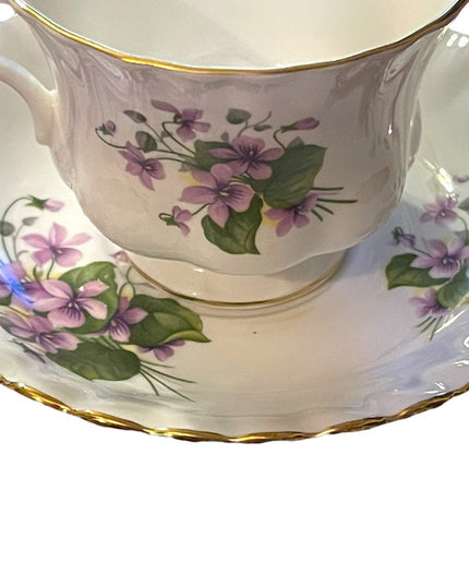 Vintage Royal Albert purple flowers floral bone china tea cup & saucer England