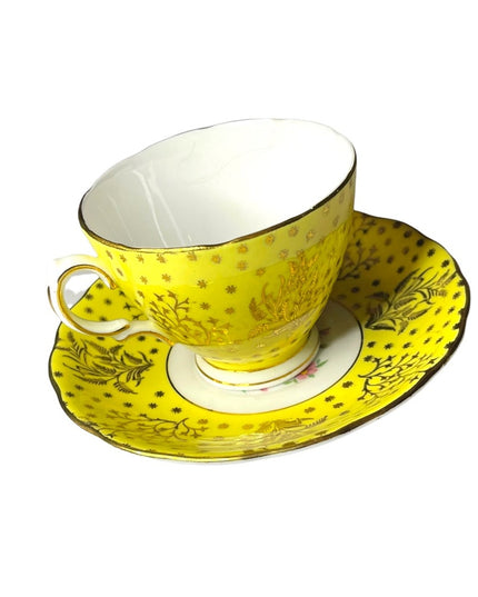 Vintage yellow floral Colclough tea cup & saucer set bone china England