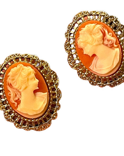 Lovely High shine gold  finish cameo fancy ornate earrings resin