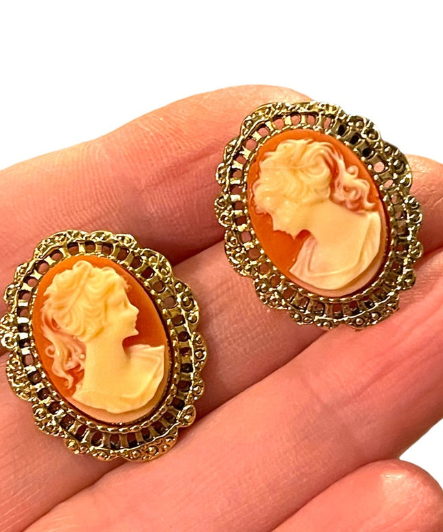 Lovely High shine gold  finish cameo fancy ornate earrings resin