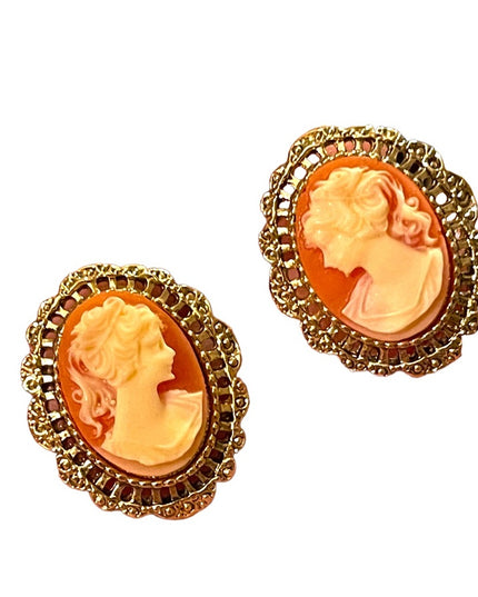 Lovely High shine gold  finish cameo fancy ornate earrings resin