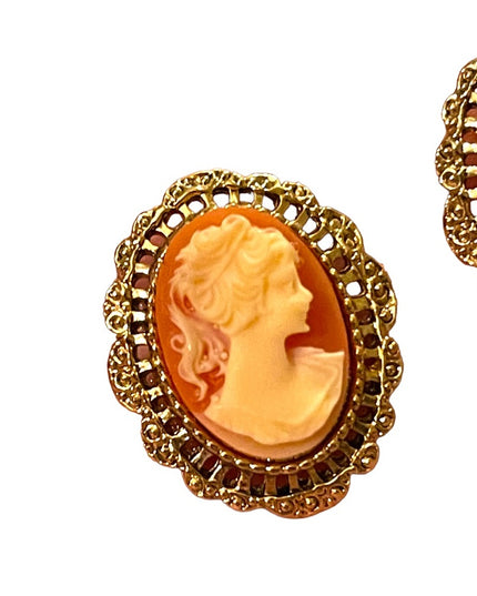 Lovely High shine gold  finish cameo fancy ornate earrings resin