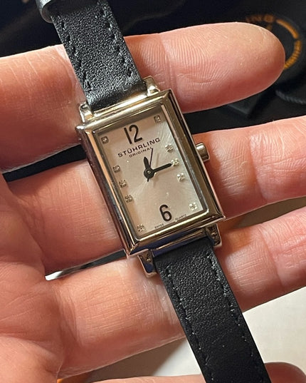 - NIB STUHRLING Origional womens watch with leather bands box papers