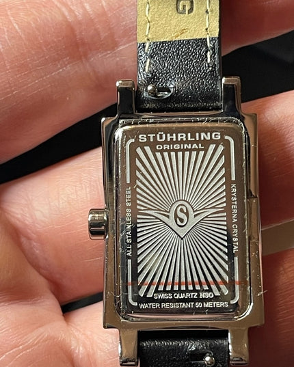 - NIB STUHRLING Origional womens watch with leather bands box papers