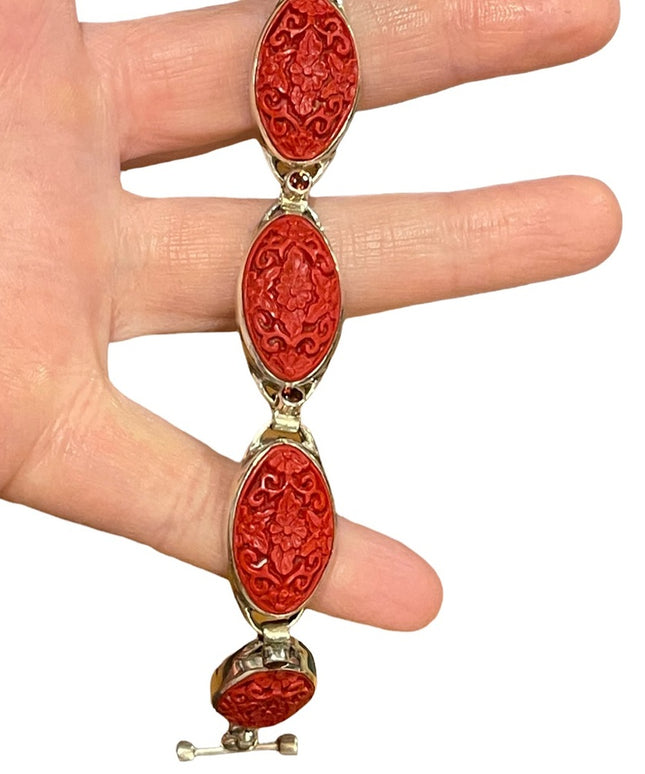 - Sajen sterling silver 925 fancy carved coral bracelet with garnets
