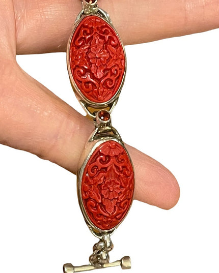 - Sajen sterling silver 925 fancy carved coral bracelet with garnets