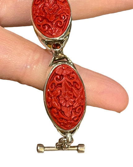 - Sajen sterling silver 925 fancy carved coral bracelet with garnets