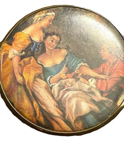 Vintage Victorian scene gold finish metal mirrored compact