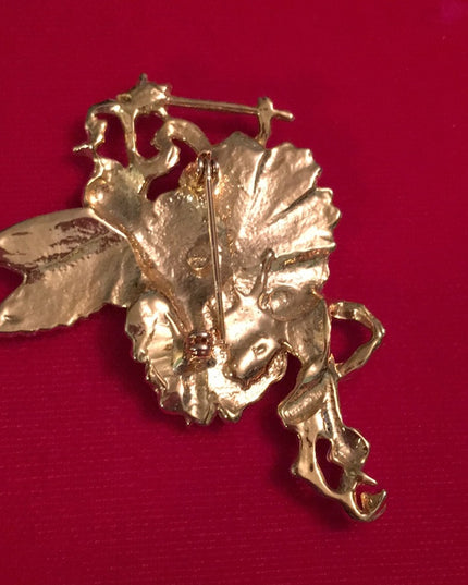 Lovely Unsigned High gold finish large fairy brooch with rhinestone