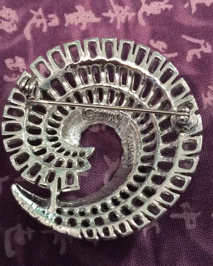 Vintage Sarah Coventry silver finish swirl brooch