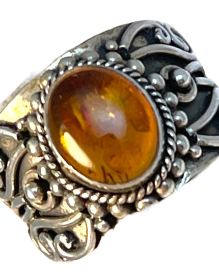 Sterling silver fancy cigar band amber ring