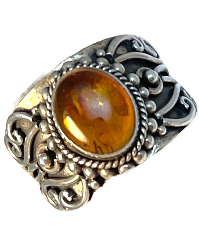 Sterling silver fancy cigar band amber ring