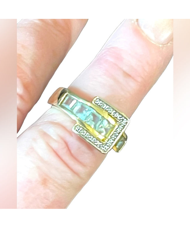 Beautiful gold plated sterling silver 925 topaz blue CZ buckle ring