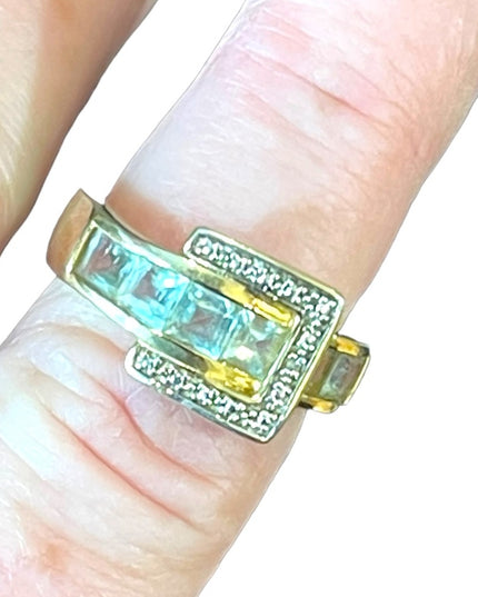 Beautiful gold plated sterling silver 925 topaz blue CZ buckle ring
