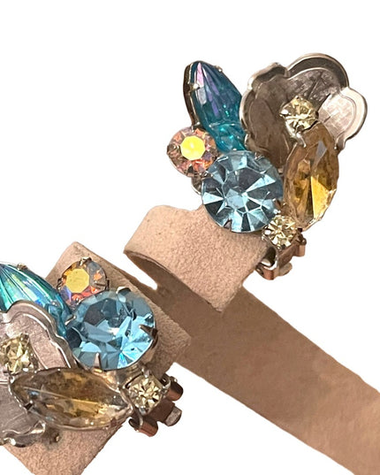 Stunning cintage fancy flower leaf blue crystal silver finish clipmon earrings