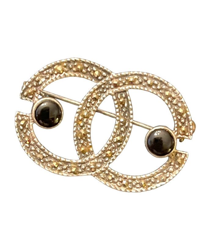 Stunning vintage sterling silver marcasite black onyx brooch