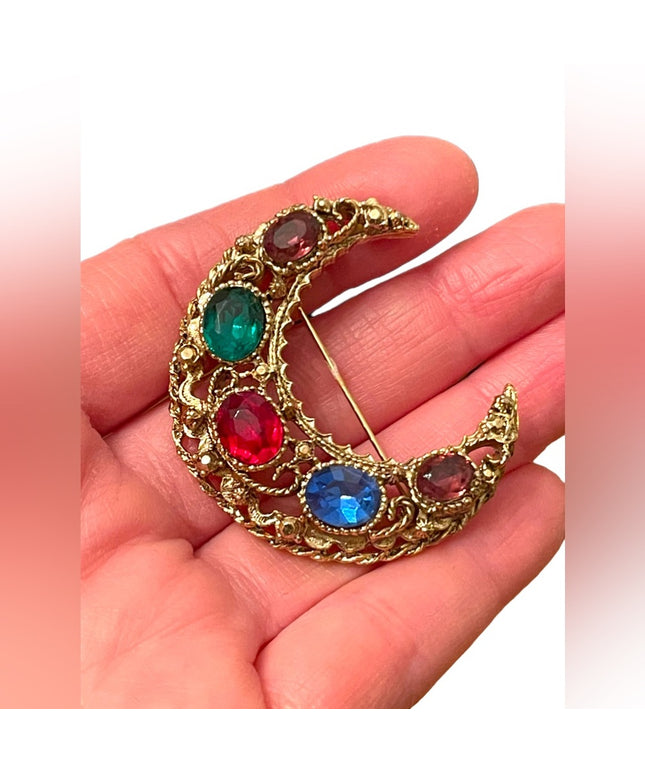 Vintage 1980s gold finish colorful rhinestone Crescent brooch