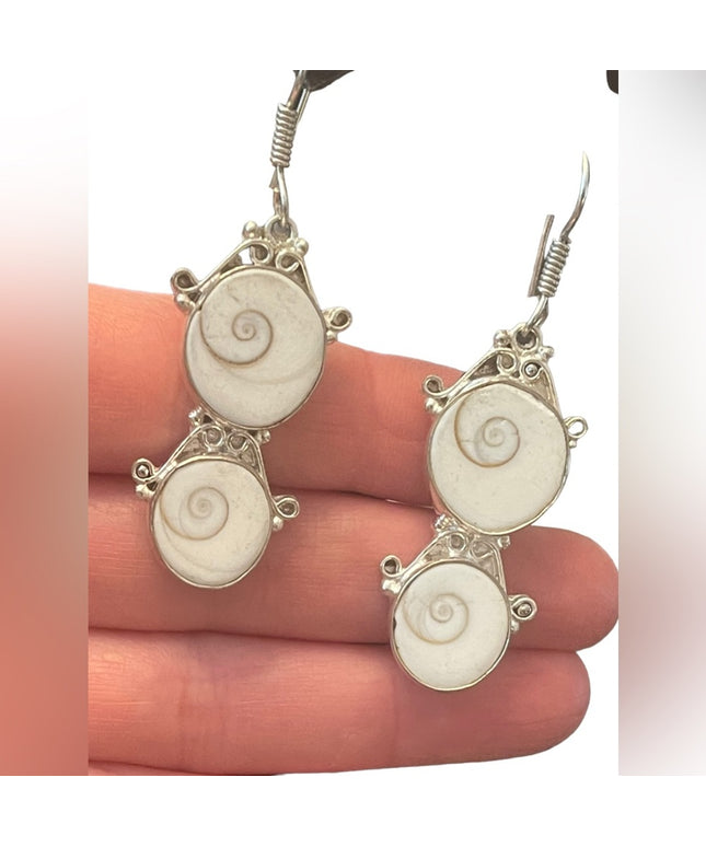 Fancy silver finish Indonesian shiva eye shell dangle earrings
