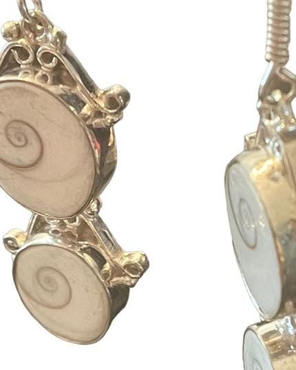 Fancy silver finish Indonesian shiva eye shell dangle earrings