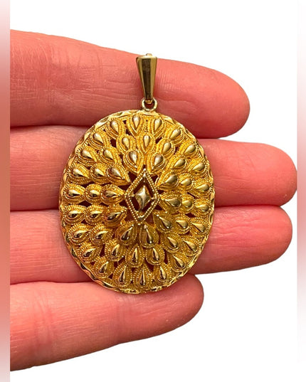 Lovely chunky Gold finish WEST fancy design oval pendant