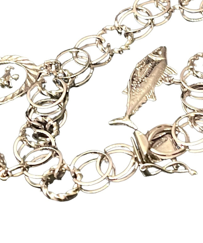 Lovely vintage sterling silver 925 Charm bracelet with charms