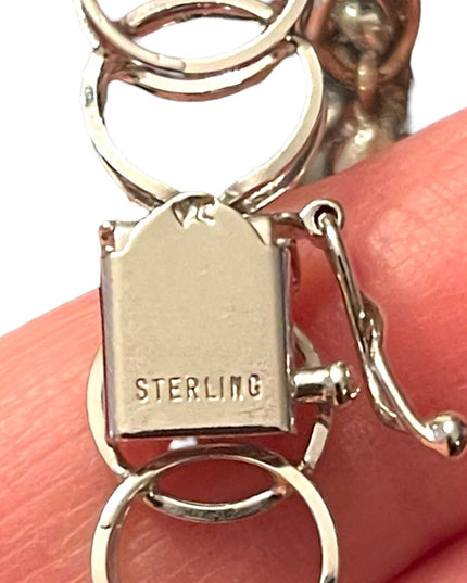 Lovely vintage sterling silver 925 Charm bracelet with charms
