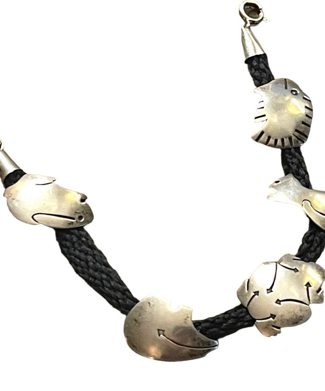 Vintage sterling silver southwestern Native handmade symbol bracelet bear fish