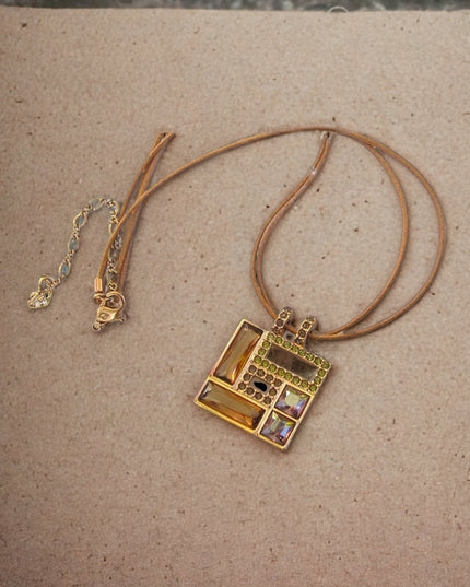 Swarovski Authentic (swan) Square crystal rose gold plt leather cord necklace