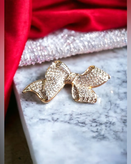VTG gold tone rhinestone bow brooch