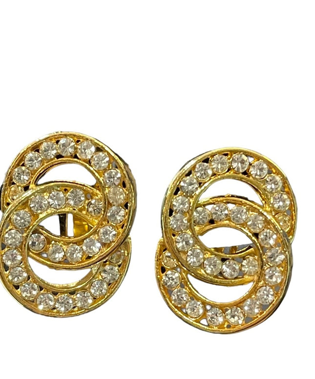 Lovely vintage 1980s NORMA JEAN gold finish rhinestone infinity circle clip ons