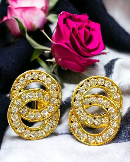 Lovely vintage 1980s NORMA JEAN gold finish rhinestone infinity circle clip ons