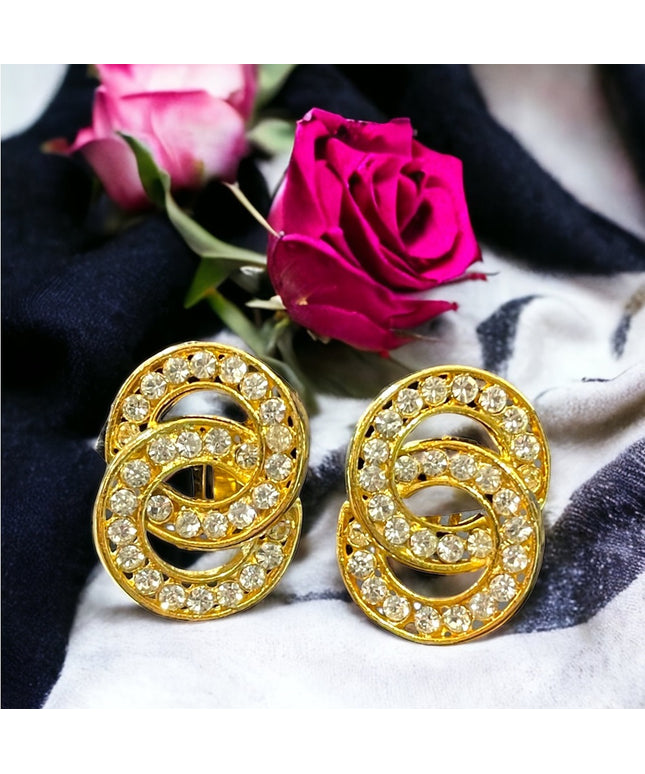 Lovely vintage 1980s NORMA JEAN gold finish rhinestone infinity circle clip ons
