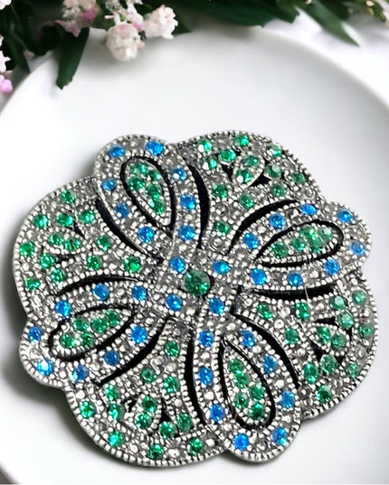 Fancy swirl blue green crystal brooch