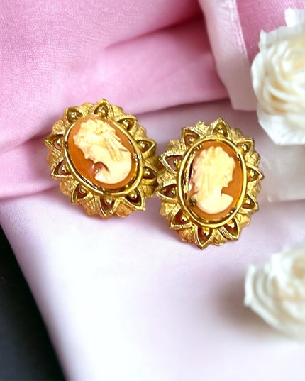 Vintage 1960s Fancy ornate gold finish resin cameo clip on earrings